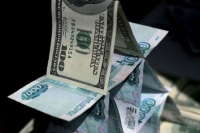 Россия переживает третью волну "финансовых пирамид"